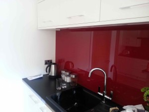 jem-cream-kitchen-with-red-glass-back-web
